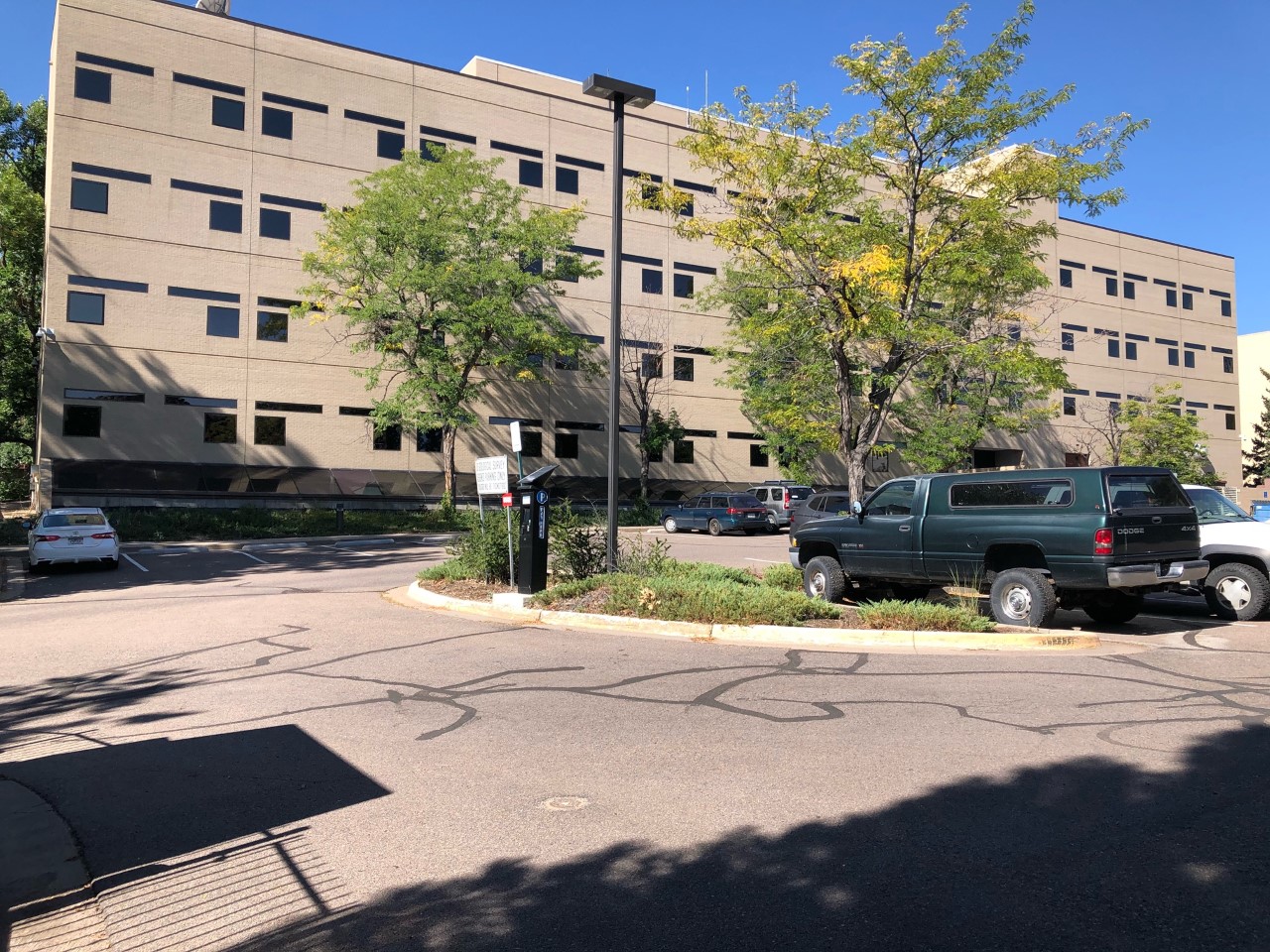 Paved parking lot beside the Geologic Hazards Science Center building
